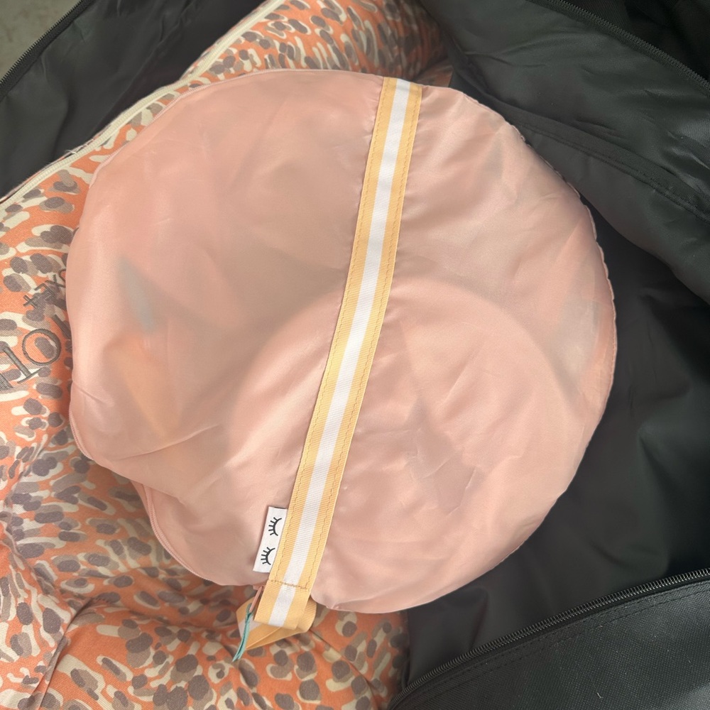 Chic Peach Round Bag with Stripe Accent